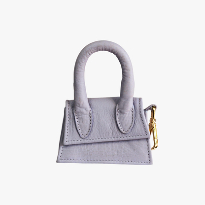 The Dog Musthaves - The Dog Musthaves designer beloningstasje voor hondenkoekjes en poepzakdispenser - lila paars